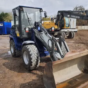Radlader CAT 906